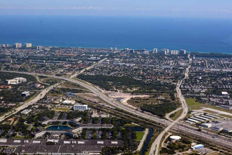 Aerial view of North Boca Raton, office campus, lake and highway
